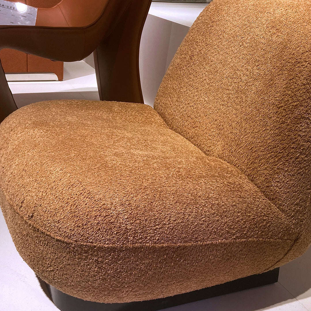 Cream boucle fabric 1 seater sofa velora in close up details.