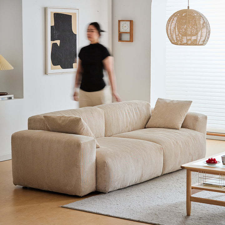 Cream corduroy velvet fabric 4 seater sofa square in details.