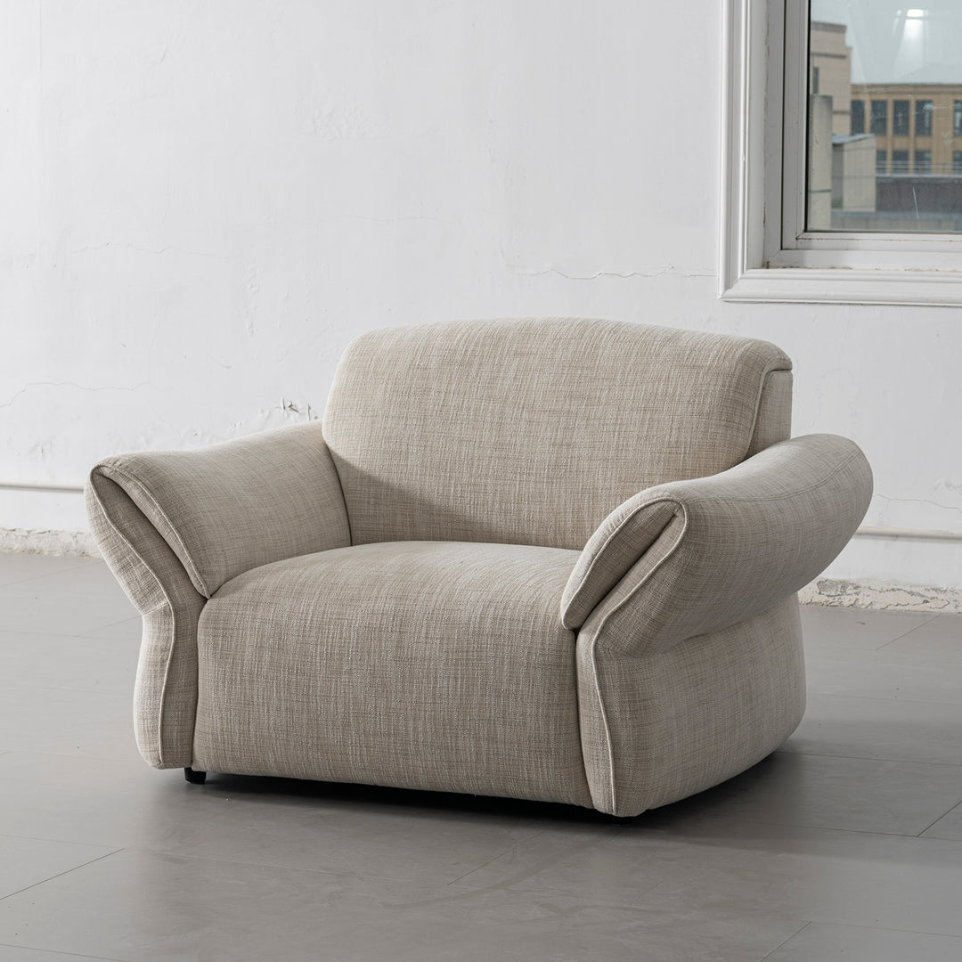 Cream mixed weave fabric 1 seater sofa lunar in real life style.