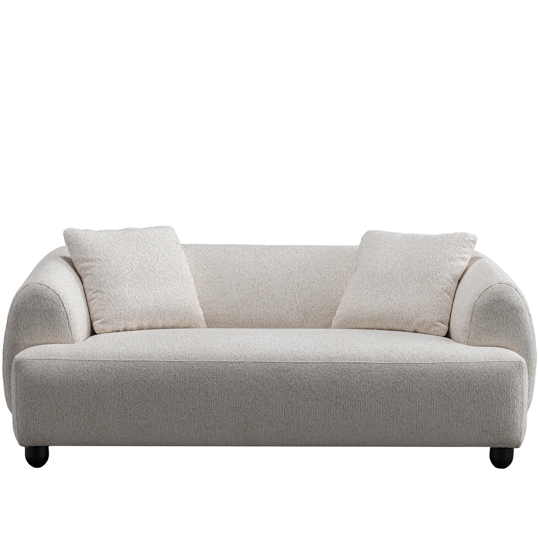 Cream mixed weave fabric 2 seater sofa puffy in white background.