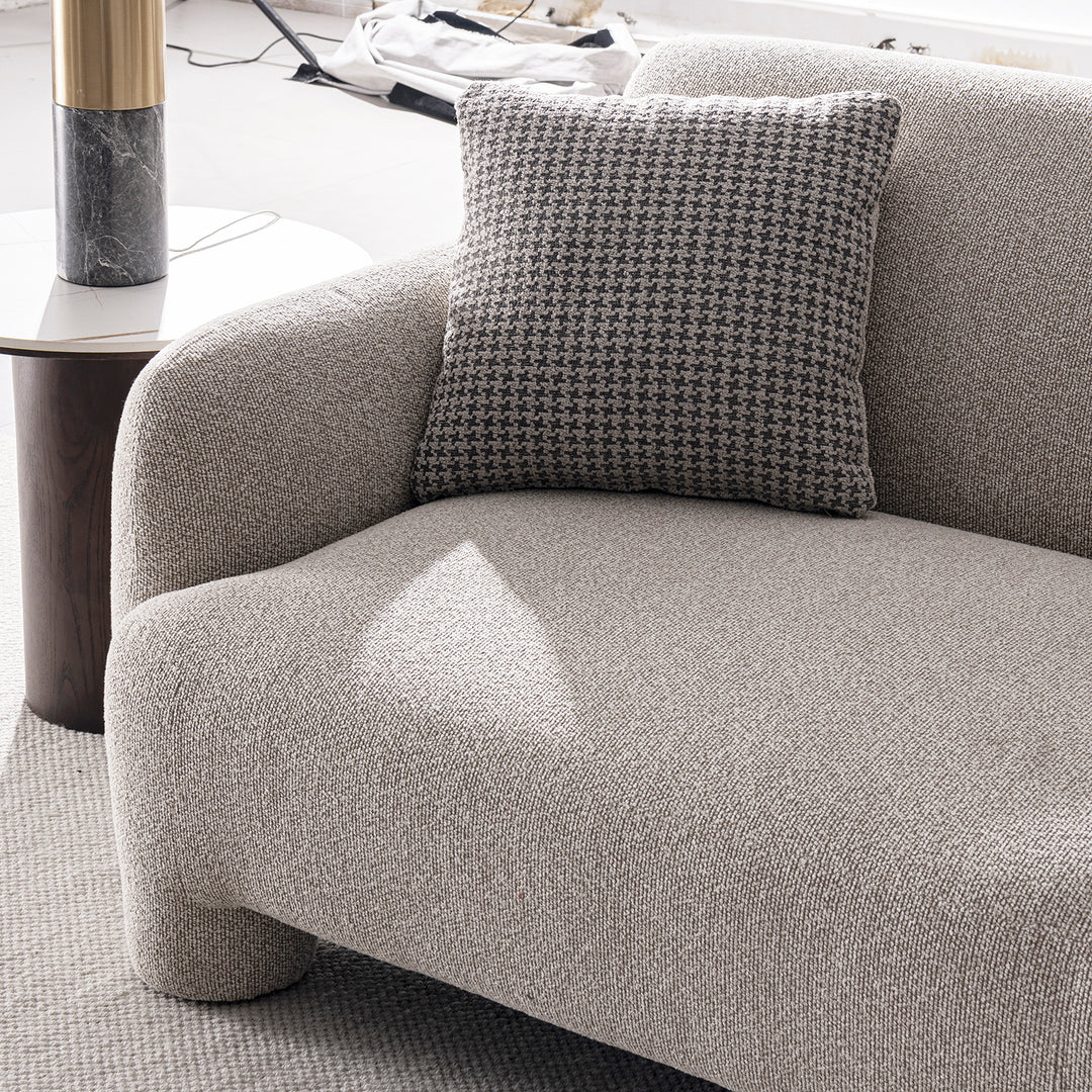 Cream mixed weave fabric 2 seater sofa syra in real life style.