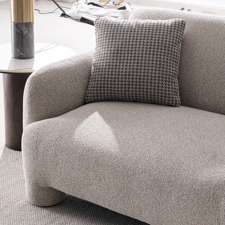 Cream mixed weave fabric 2 seater sofa syra in real life style.