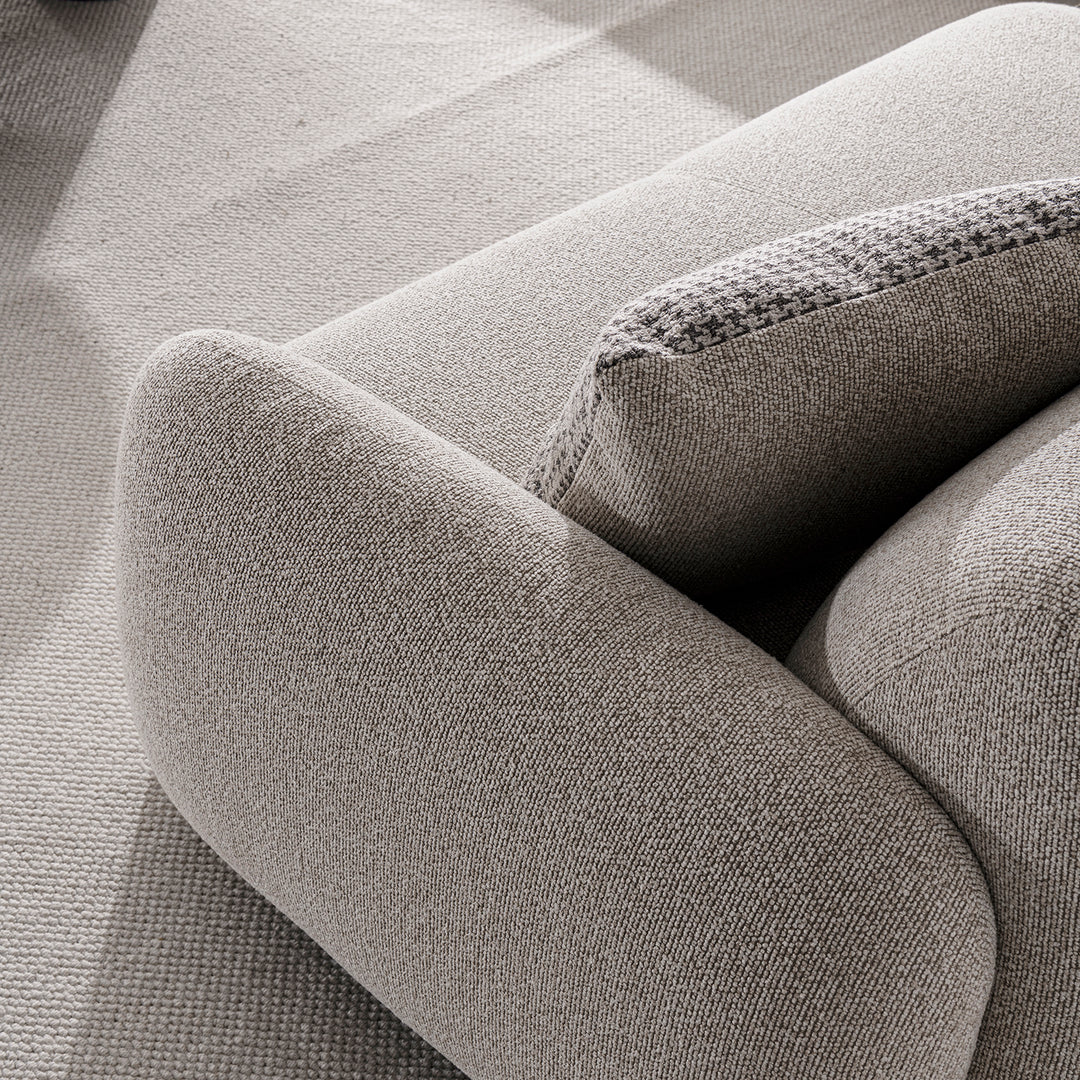 Cream mixed weave fabric 2 seater sofa syra with context.