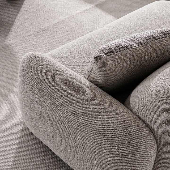 Cream mixed weave fabric 2 seater sofa syra with context.