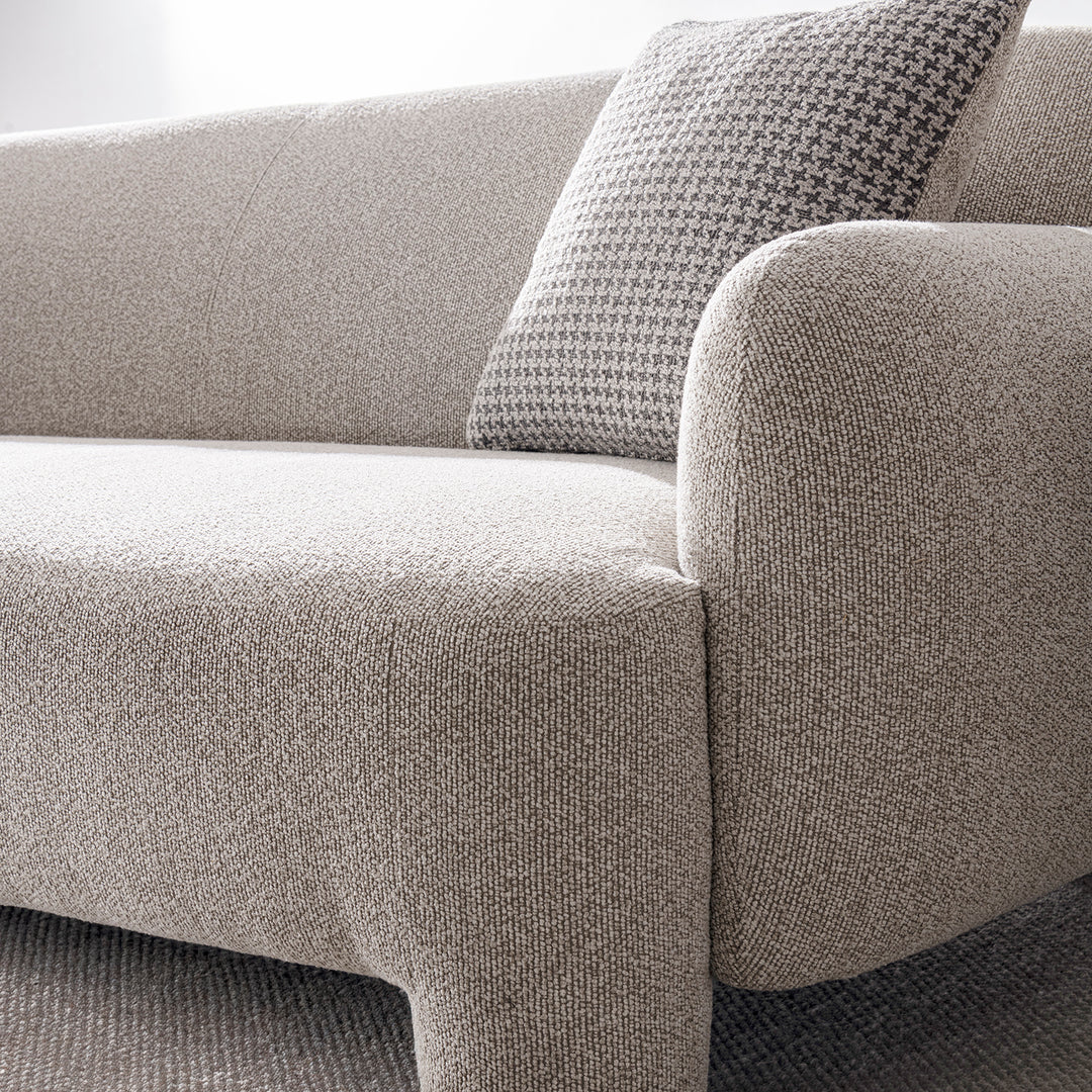 Cream mixed weave fabric 2 seater sofa syra in details.