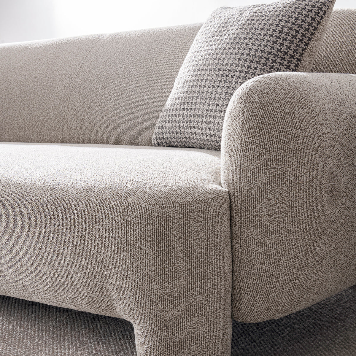 Cream mixed weave fabric 2 seater sofa syra in details.