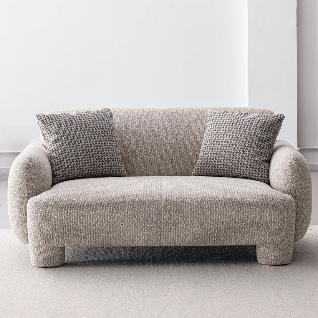 Cream mixed weave fabric 2 seater sofa syra in close up details.