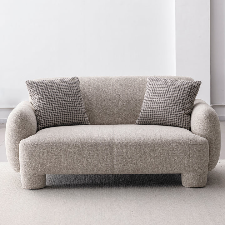 Cream mixed weave fabric 2 seater sofa syra in close up details.