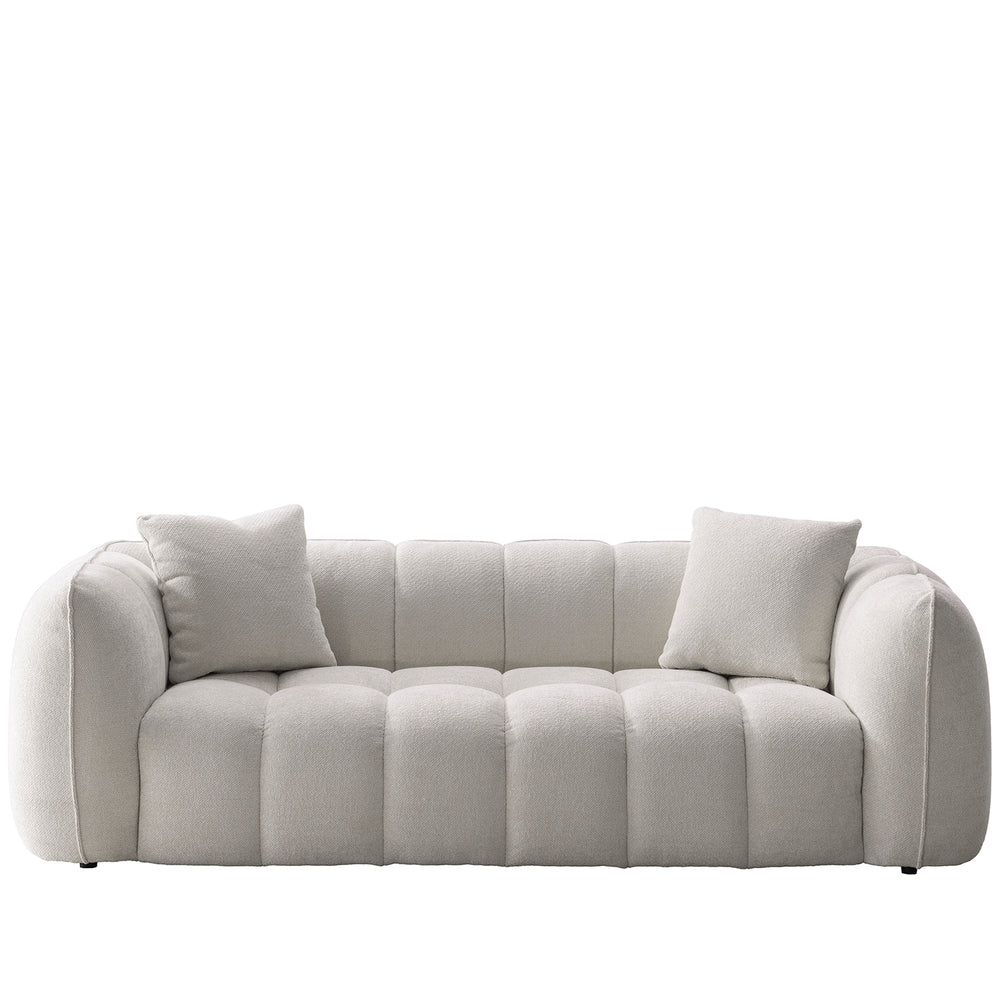 Cream mixed weave fabric 3 seater sofa puddy in white background.