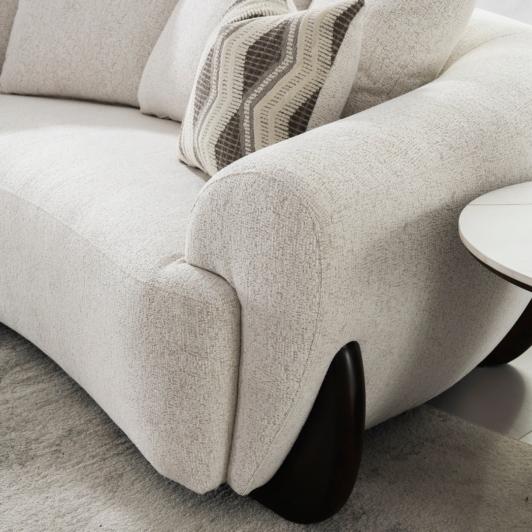 Cream mixed weave fabric 3 seater sofa swoop with context.