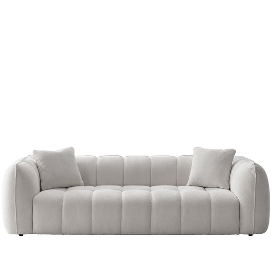 Cream mixed weave fabric 4 seater sofa puddy in white background.