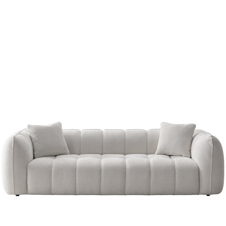 Cream mixed weave fabric 4 seater sofa puddy in white background.