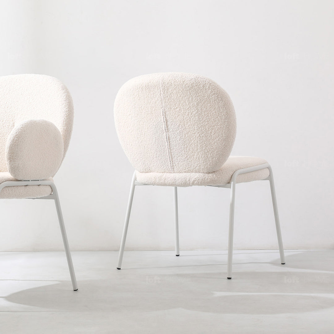 Cream boucle dining chair pavlova ii with context.