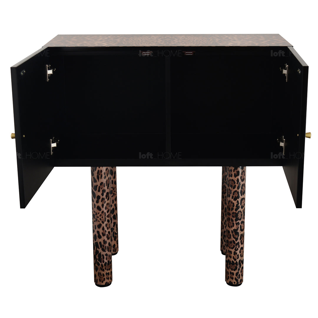 Eclectic wood storage cabinet high leopard in close up details.