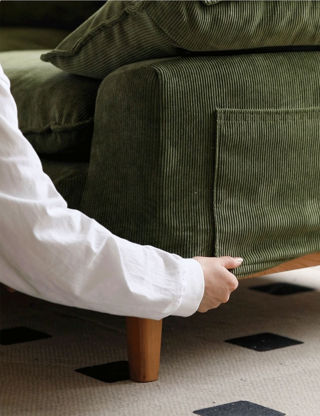 Scandinavian premium corduroy velvet fabric sofa cover in real life style.