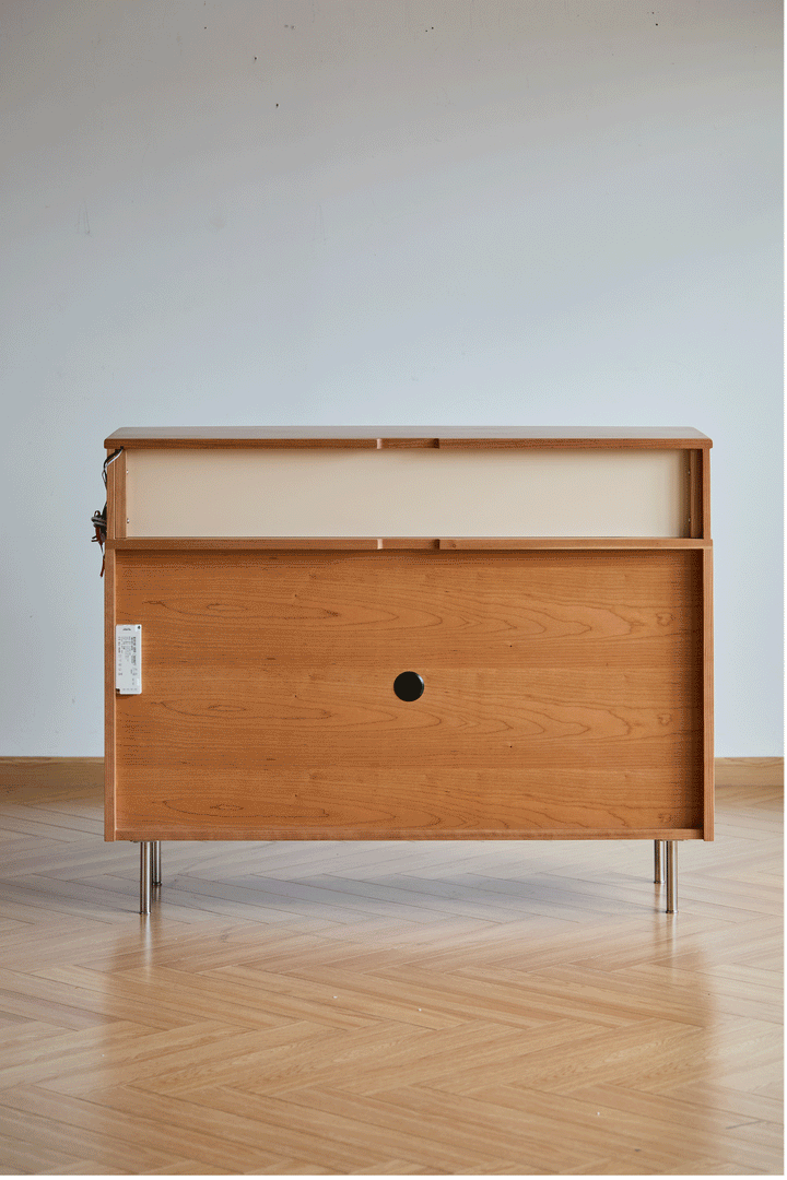 Scandinavian cherry wood side cabinet blue mountain in real life style.