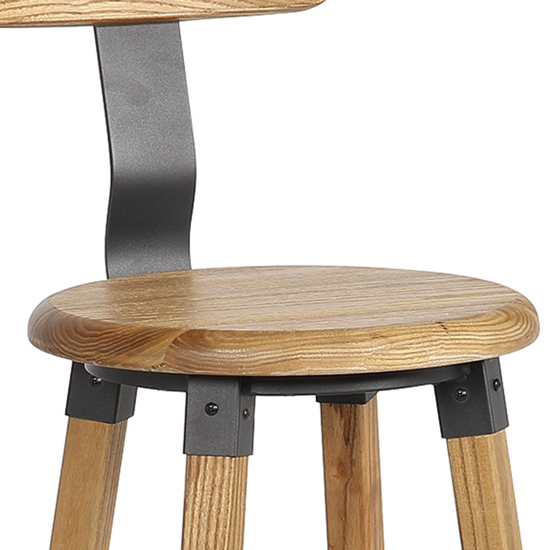 Industrial elm wood round bar stool herman in still life.