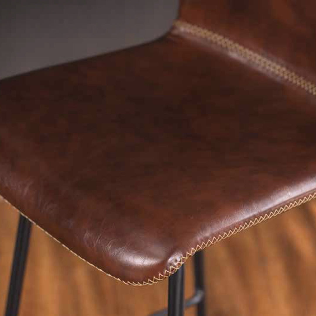 Industrial pu leather bar chair stitch in still life.