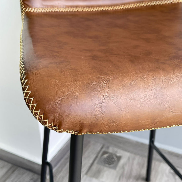 Industrial pu leather bar chair stitch in panoramic view.