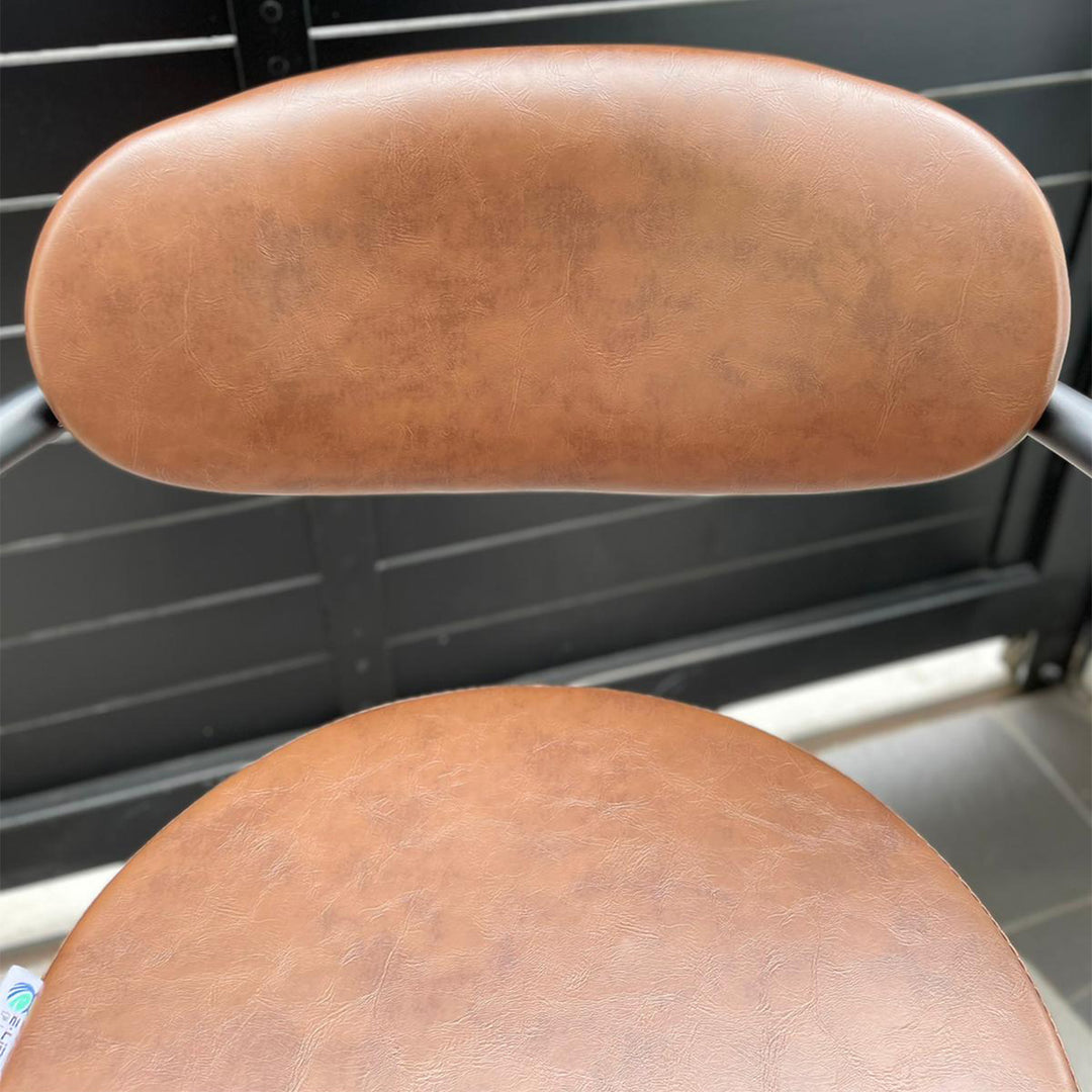 Industrial pu leather bar stool abner with context.