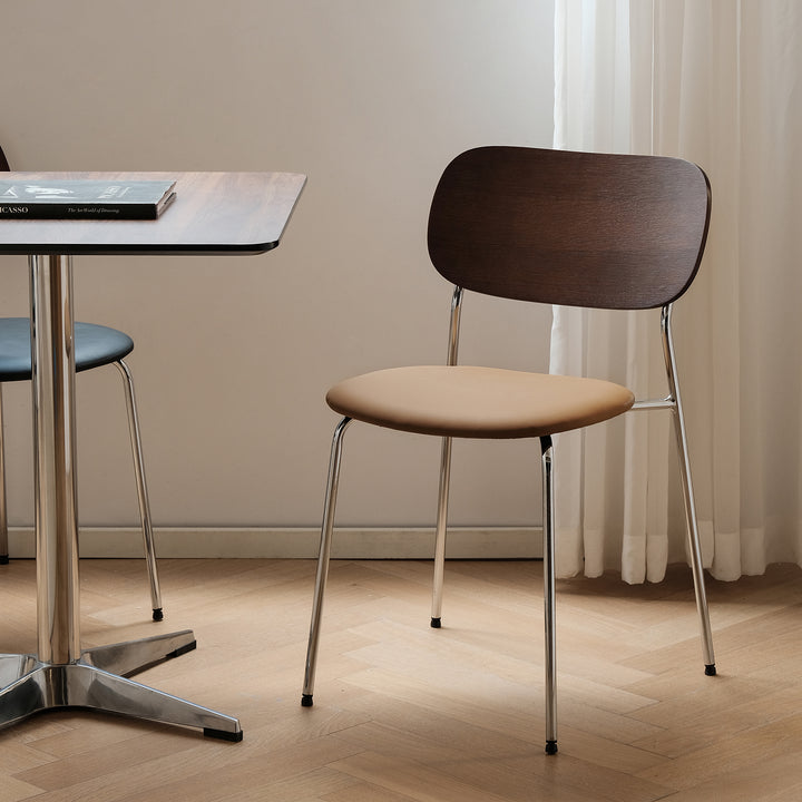 Industrial pu leather dining chair nika in white background.
