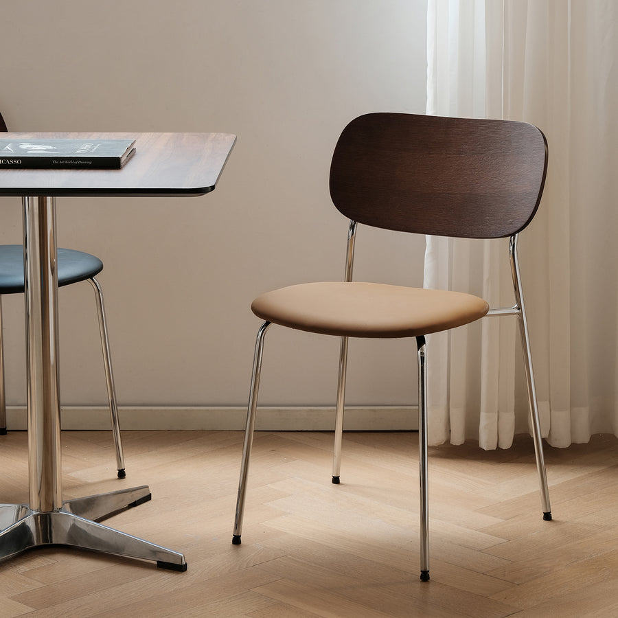 Industrial pu leather dining chair nika in white background.