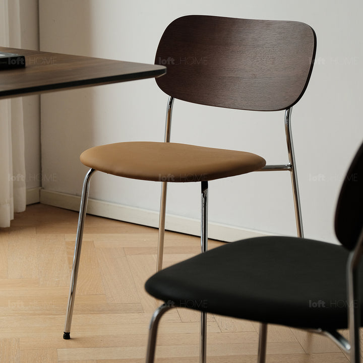 Industrial pu leather dining chair nika in panoramic view.