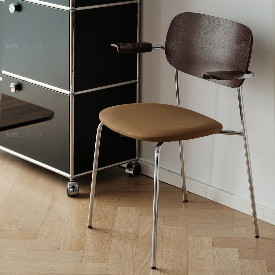 Industrial pu leather dining chair with armrest nika in close up details.