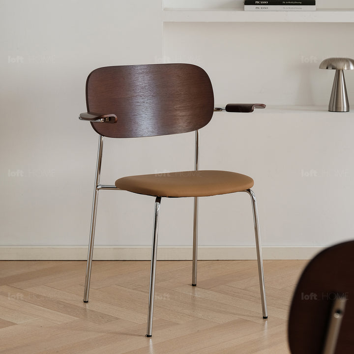 Industrial pu leather dining chair with armrest nika in real life style.