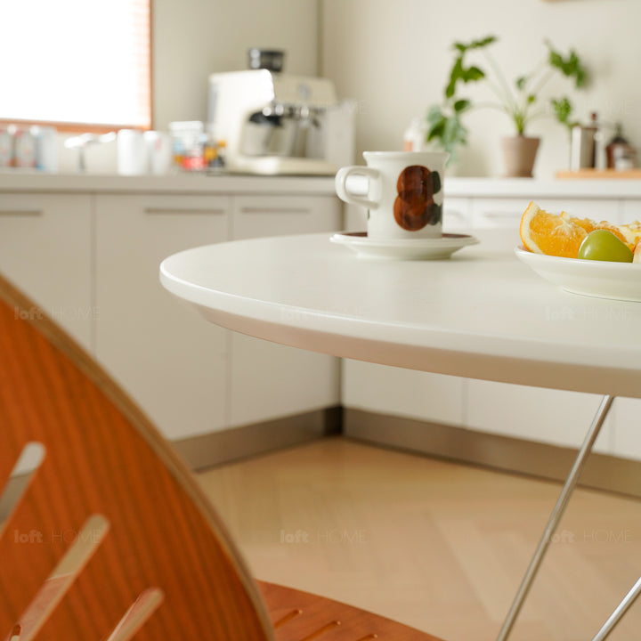 Industrial plywood steel dining table eames in close up details.