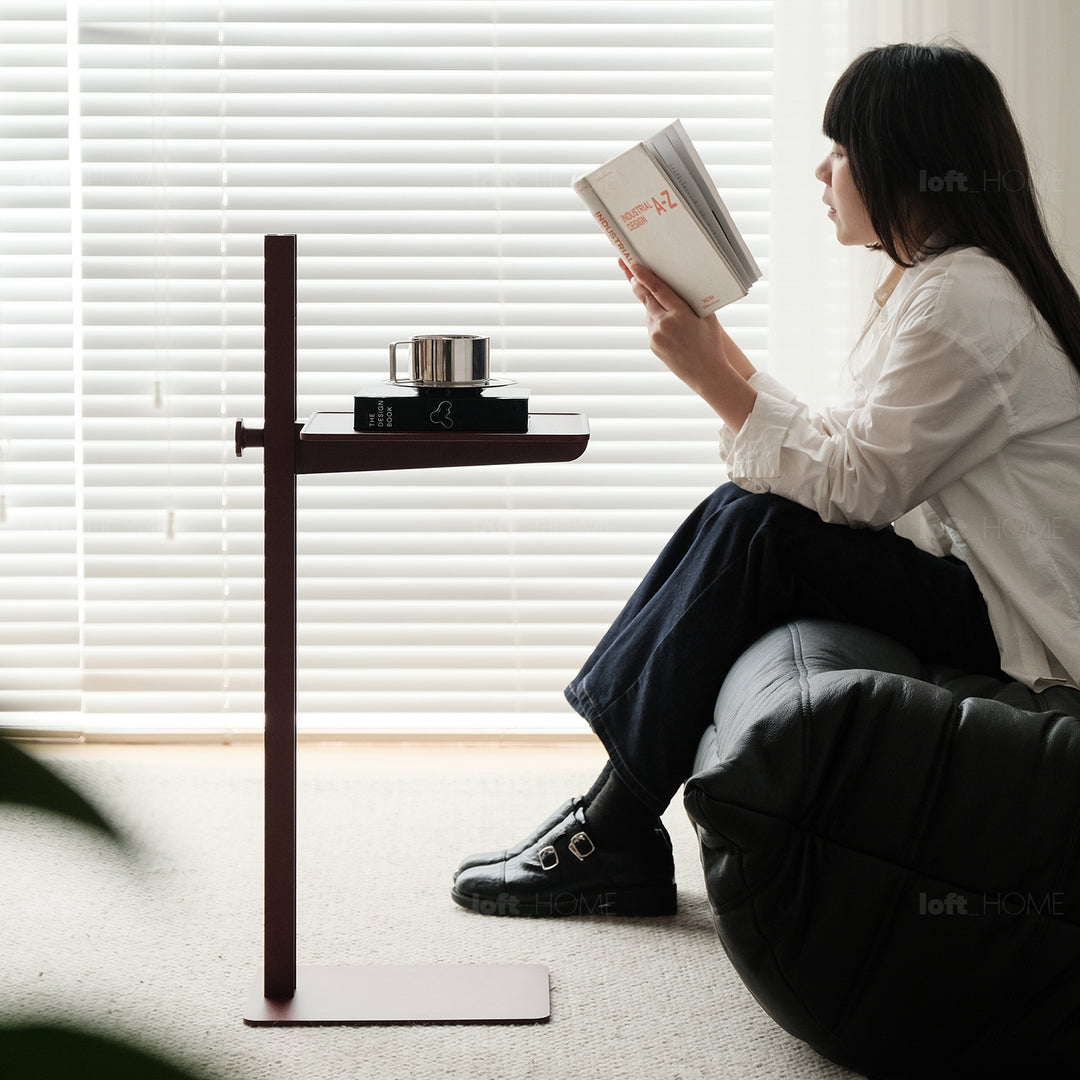 Industrial steel side table string in still life.