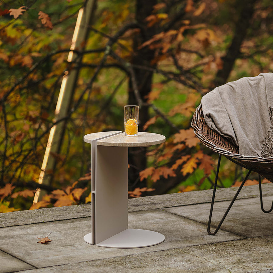 Industrial travertine stone metal side table liska primary product view.