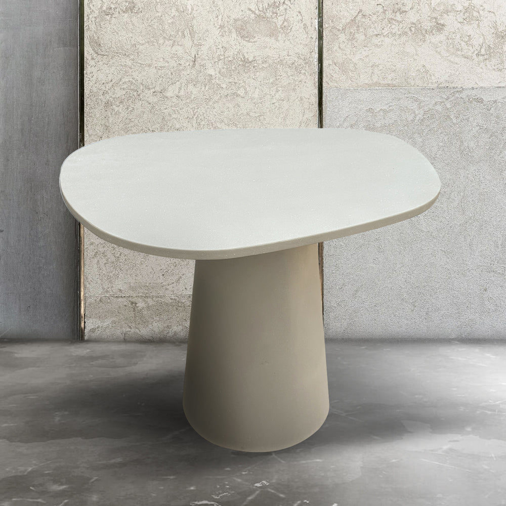 Japandi microcement round dining table voro primary product view.