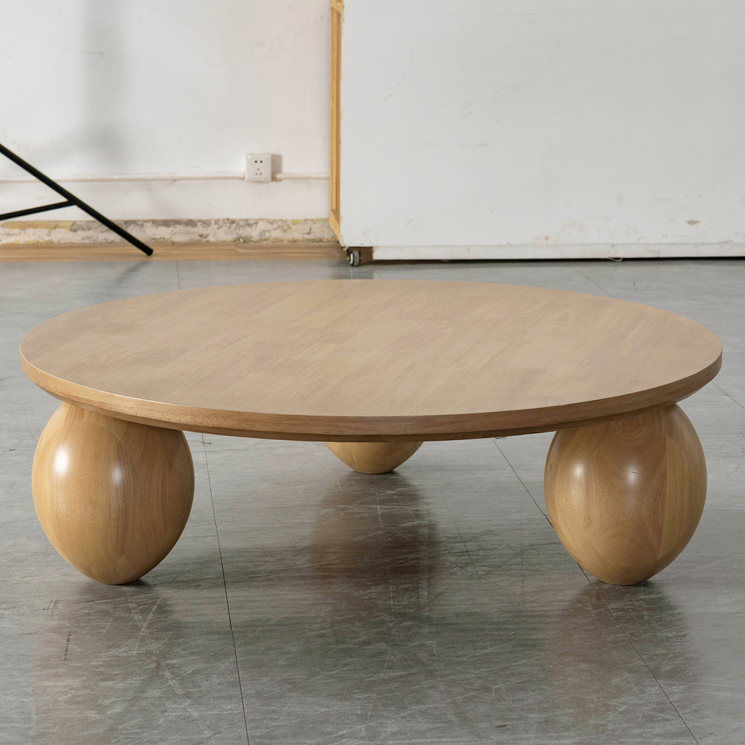 Japandi rubber wood coffee table tumbo in real life style.