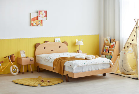 Cheerful children's bedroom featuring a wooden bed with a cute bear headboard, playful decor, and vibrant yellow accents, linking to Loft Home's kid bed collection.