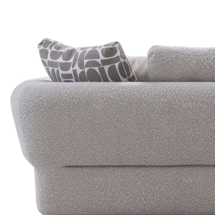 Minimalist boucle fabric 4.5 seater sofa couch with context.