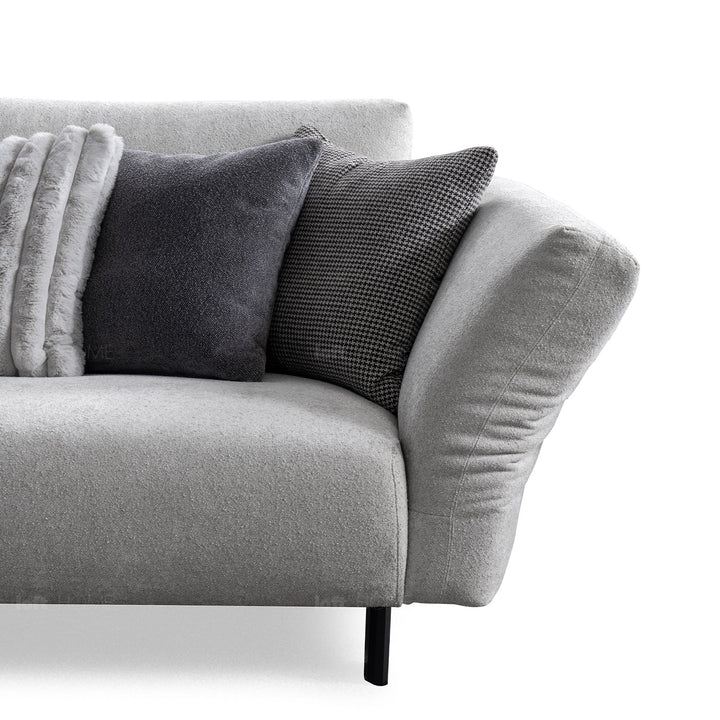Minimalist boucle fabric bendable armrest 4.5 seater sofa pristine material variants.