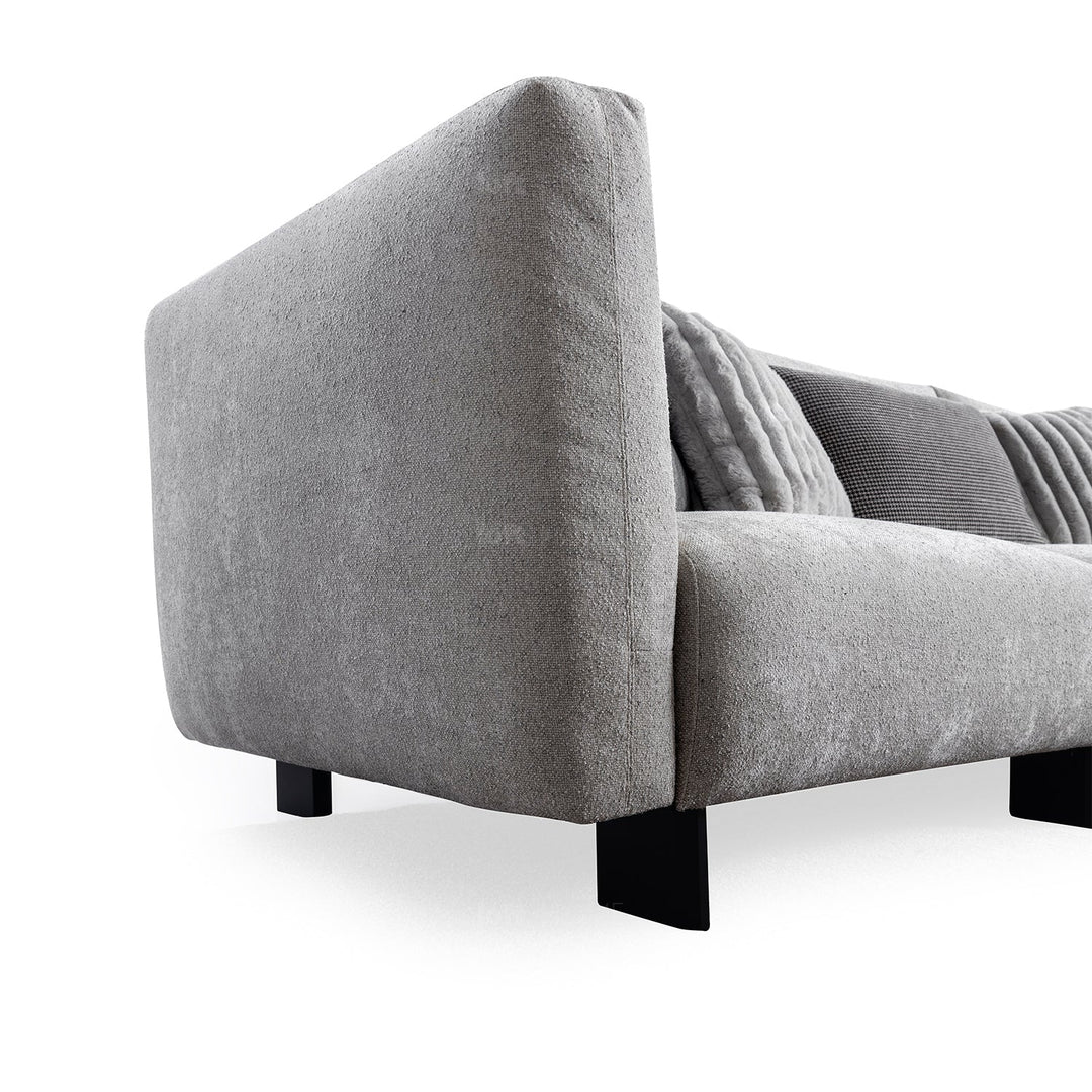 Minimalist boucle fabric bendable armrest 4.5 seater sofa pristine in real life style.