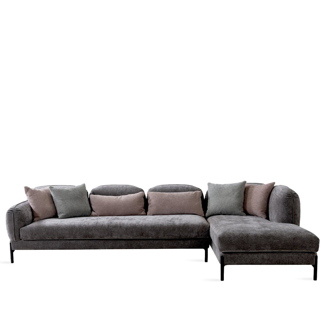 Minimalist fabric l shape sectional sofa stylish 3.5+l in white background.