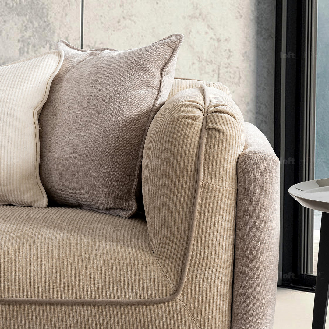 Minimalist corduroy velvet fabric 4.5 seater sofa fluff in panoramic view.