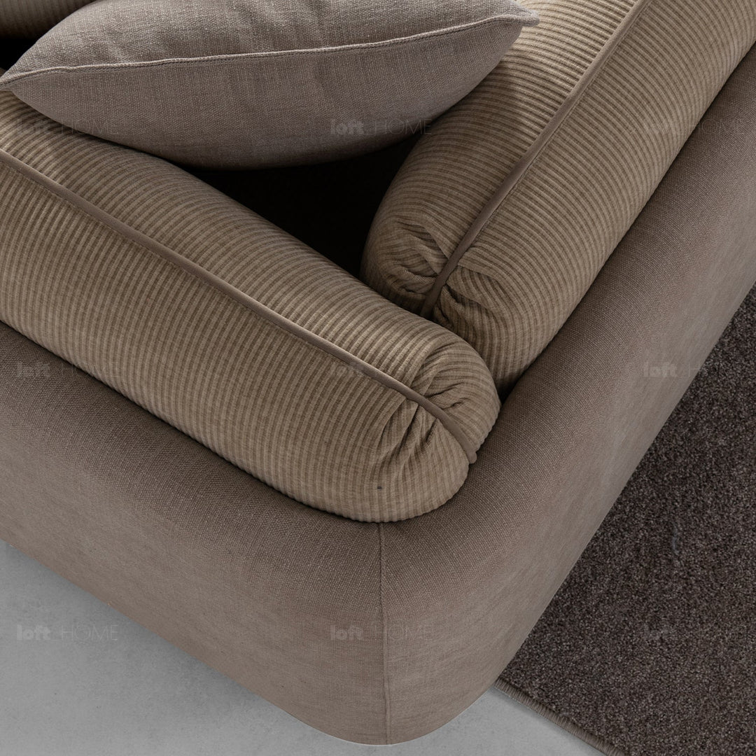 Minimalist corduroy velvet fabric 4.5 seater sofa fluff in still life.