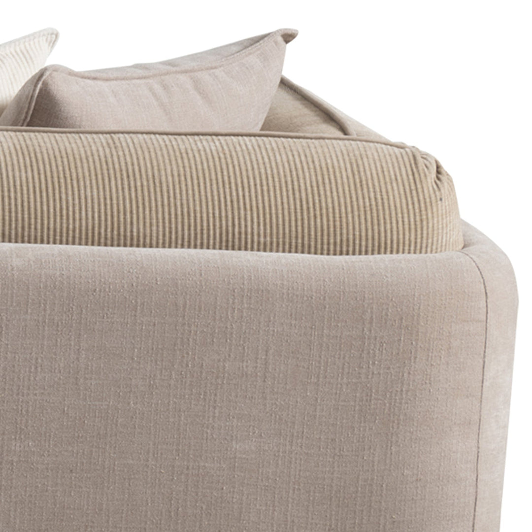 Minimalist corduroy velvet fabric 4.5 seater sofa fluff in close up details.