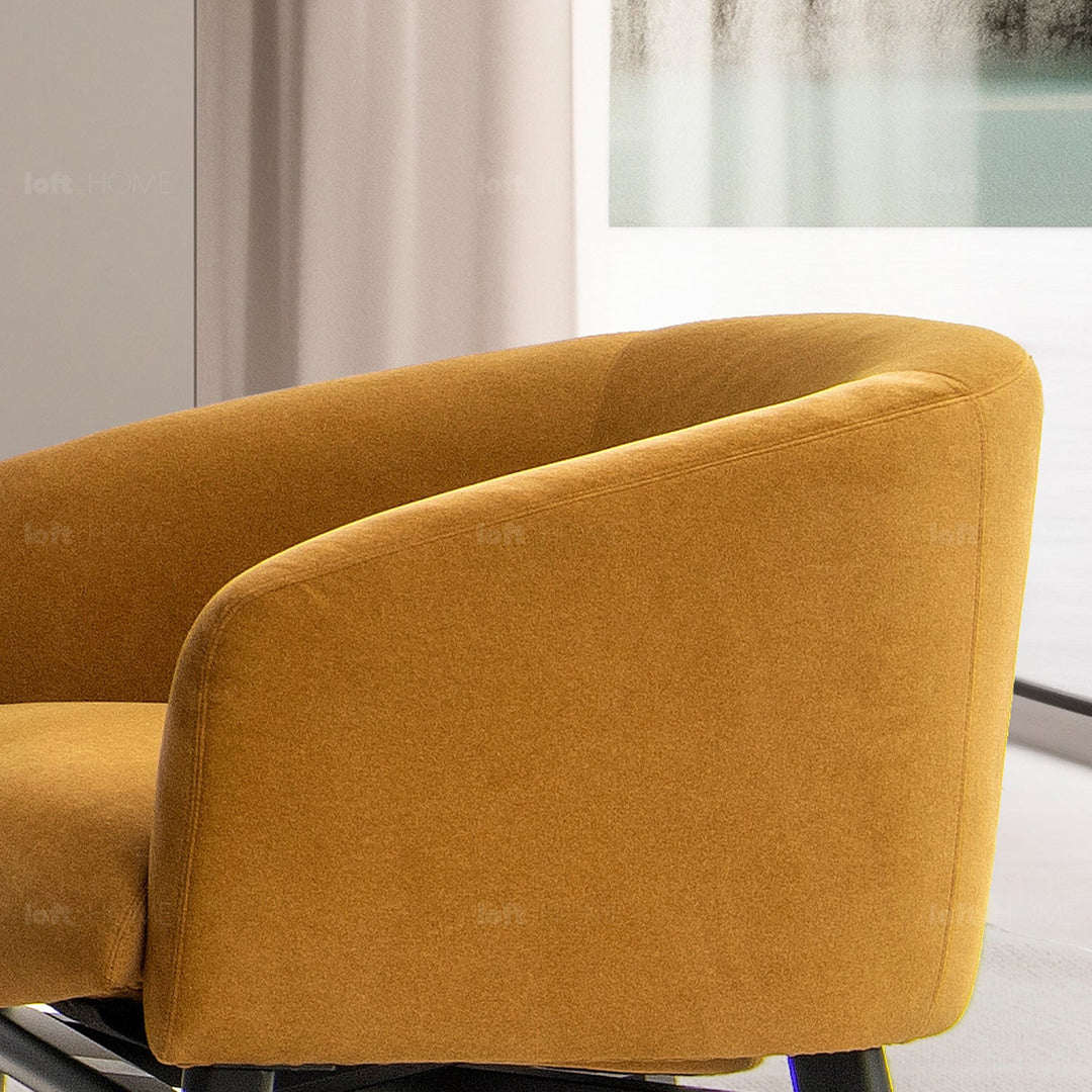 Minimalist fabric 1 seater sofa ginge in panoramic view.