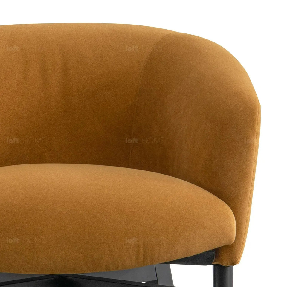 Modern suede fabric 1 seater sofa ginge in real life style.