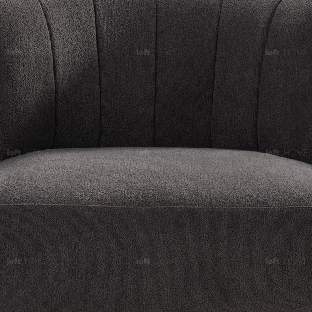 Minimalist fabric 1 seater sofa hedge in panoramic view.