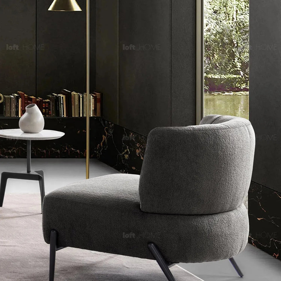 Modern sherpa fabric 1 seater sofa hedge in close up details.