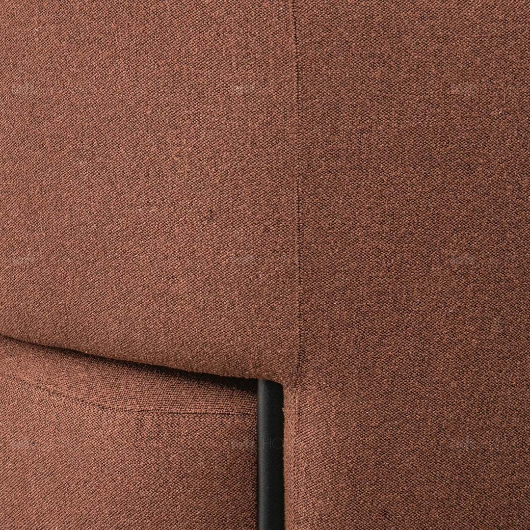 Minimalist fabric 1 seater sofa hinger in panoramic view.