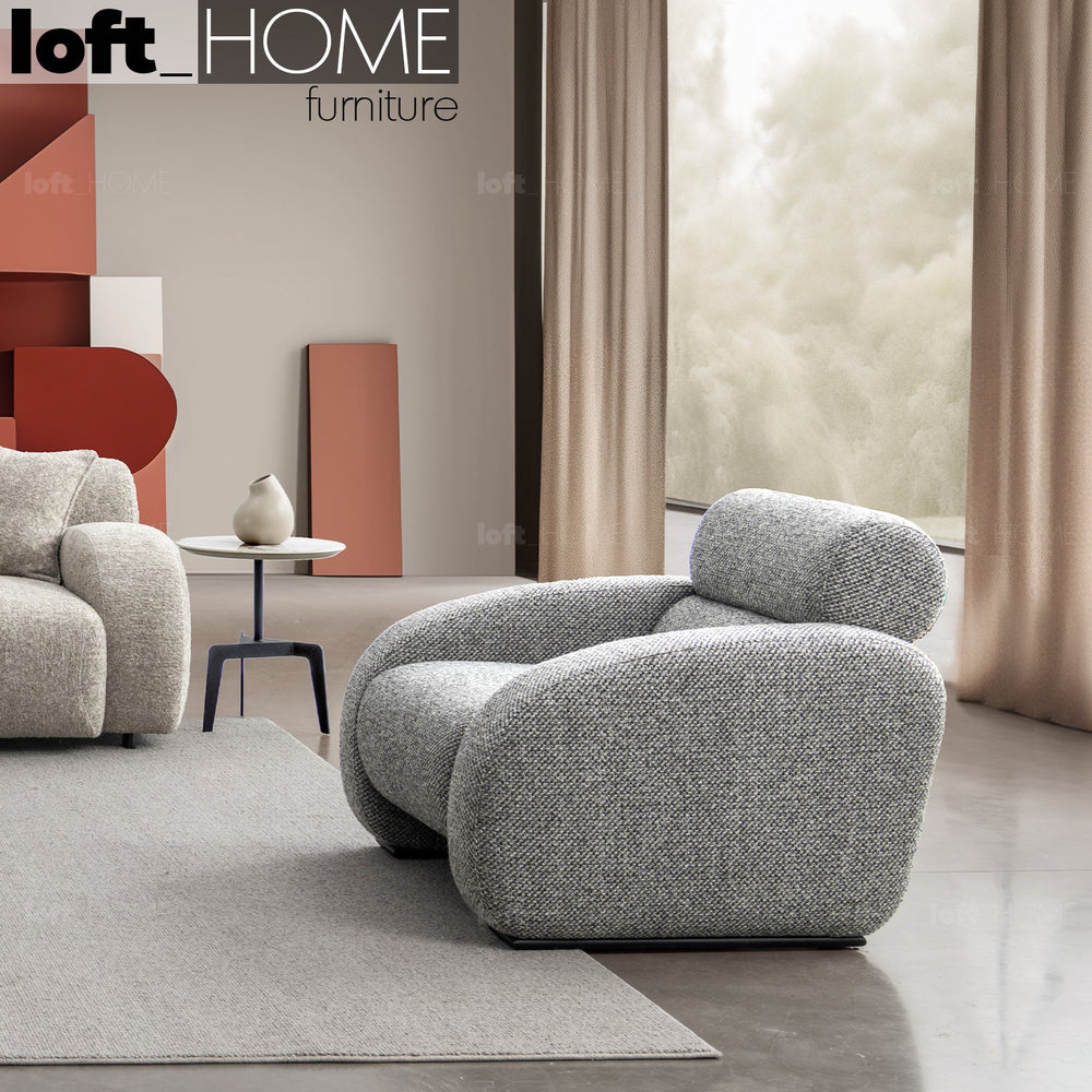 Minimalist fabric 1 seater sofa monolithe primary product view.