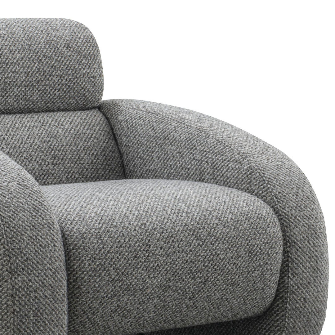 Minimalist fabric 1 seater sofa monolithe with context.
