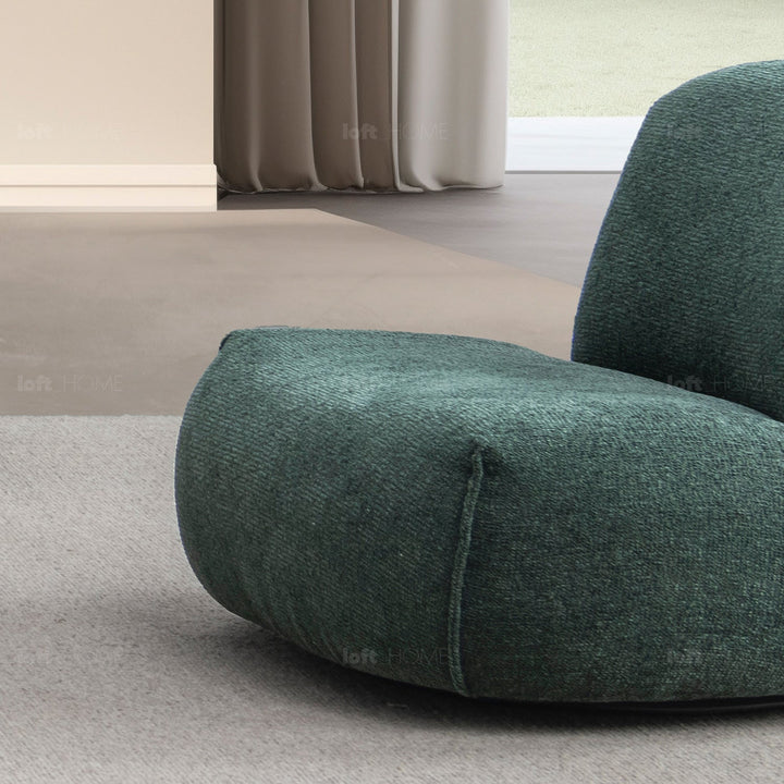 Minimalist fabric 1 seater sofa moss in panoramic view.
